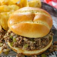 Philly Cheese Steak Roll · Peppers, onions, and melted American cheese.
