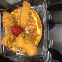 Wing and Waffle Special · Belgium waffle with 4 pieces fried wings, powered sugar and strawberry.