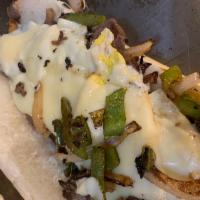 H3. Philly Cheese Steak Hero · Roast beef, melted mozzarella cheese, grilled peppers and onions.