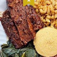 Vegan Rib Meal · 4 pieces of savory vegan ribs served with your choice of 2 sides.