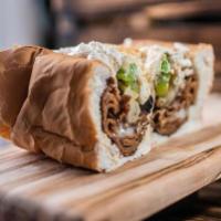 Philly Cheesesteak Sandwich · Thinly sliced steak, grilled onions, and mixed peppers, provolone cheese, and house mayonnai...