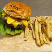 Original Burger · American cheese, lettuce, tomato, dill pickles, onions, Greek sauce. Side of fries