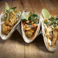 Fish Tacos · Fried cod, pickled veg chipotle aioli.