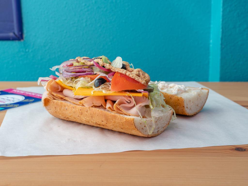 Bada Bing Club Sandwich · Turkey, ham, bacon, cheddar, lettuce, tomato, onion, pickles, pepperoncini, dijon mustard, mayo