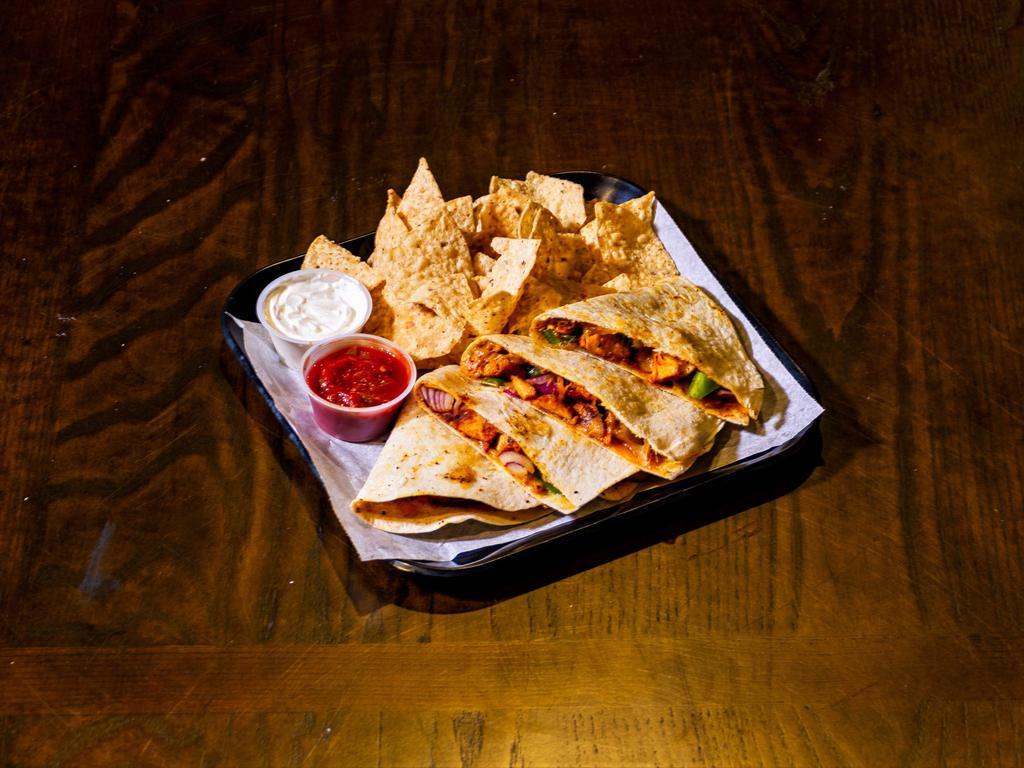 Chicken Quesadilla · Chicken, green peppers, red onions, cheddar cheese, side salsa and sour cream.