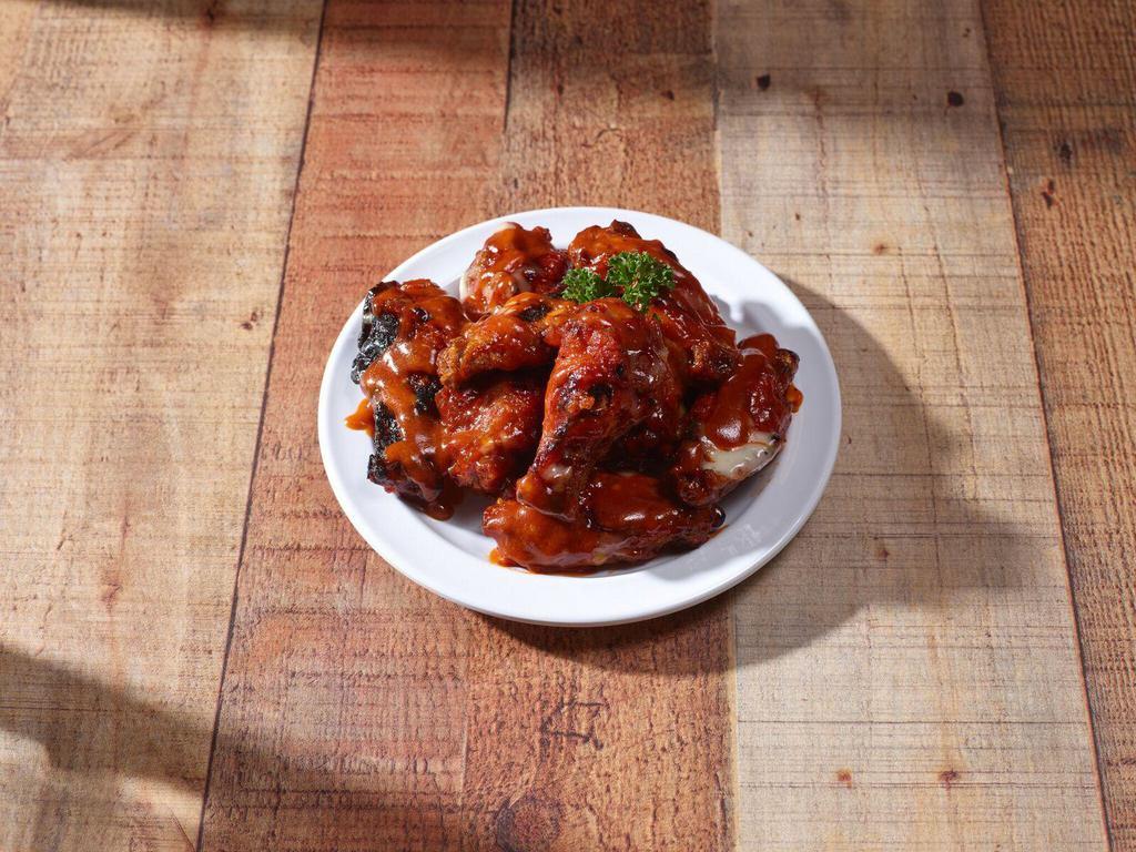 Jumbo Wings with Homemade Sauce · Served with one of our homemade sauces. Sold by 10s.