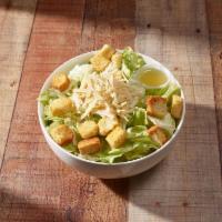 Caesar Salad · Romaine lettuce, croutons, Asiago cheese and our house egg less Caesar dressing.