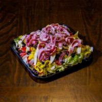 Antipasto Salad · lettuce, tomato, onions,ham,salami,provolone,banana peppers,onions and olives