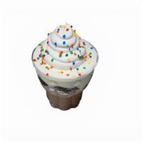 DQ Cupcake · A cake for one. Irresistible fudge and crunch center that's surrounded by creamy vanilla and...