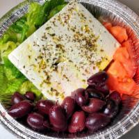 Feta Appetizer · Our Imported Mad Greek Feta Cheese appetizer comes with 2 Toasted Pita’s, Olives & Impor...