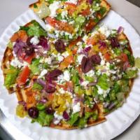 Salad Pita Pizza · Greek Pizza - Toasted Pita Bread topped w/ Lettuce, Tomato, Red Onion, Olive, Pepperoncini, ...