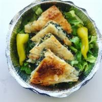 Spanakopita - Appetizer · Layers of crisp phyllo dough filled w/ spinach, feta cheese and fresh herbs