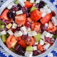 Village (Horiatiki) · No Lettuce here! Tomatoes, cucumber, red onion, feta cheese & Kalamata olives w/ our hom...