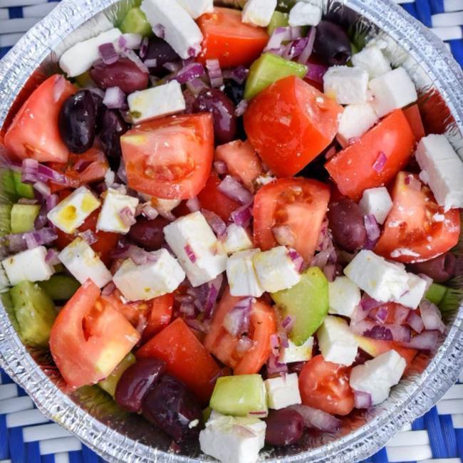 Village (Horiatiki) · No Lettuce here! Tomatoes, cucumber, red onion, feta cheese & Kalamata olives w/ our homemade Greek Dressing