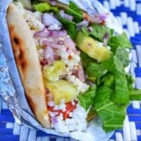 Salad Pita · Packed w/ Fresh Romaine Lettuce, Tomato, Cucumber, Diced Red Onion & Feta Cheese on a To...