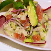 Ceviche Mahi Mahi · Citrus-marinated mahi mahi, cilantro, avocado, red onions, and tomatoes.