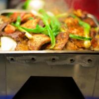 Acapulco Parrillada for 2 · Pork chops, flap steak, chicken breast, shrimp, Mexican sausage, mushrooms, onions and bell ...