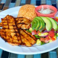 Pollo a la Parrilla · Grilled chicken breast seasoned with Panchito's sauce, with mix green salad, avocado & mango...