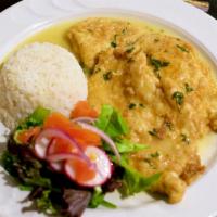 Pollo Jalisco · Chicken breast dipped in flour and egg, Sauteed in white wine & lemon sauce. Served with whi...