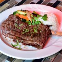 Arrachera Sunrise · Skirt steak(entran'a). Served with white rice and vegetables.