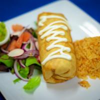 Super Chimichanga · Big deep-fried flour tortilla wrap filled  chicken, beef and cheese with sour creme on top a...