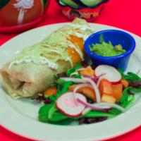 Super Burrito · Stuffed with rice and beans, cheese, and lettuce, topped with sour cream, green and red sauc...