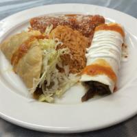 Combo Sunrise · Beef burrito with beans and cheese, red enchilada with  chicken, ground beef crispy taco, le...