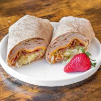 Turkey Club Wrap · Turkey, Swiss cheese, lettuce, tomatoes, bacon and ranch dressing.