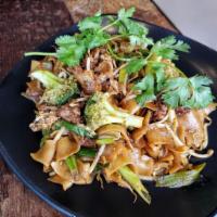 Pad See Ew · Vegetarian option available. Stir-fried rice noodles with egg, green onions, bean sprouts, b...