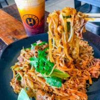 Pad Thai · Stir-fried rice noodles with egg, tofu, bean sprouts, crushed peanuts, lime, and with your c...
