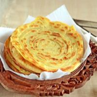 Lachha Parantha · Buttered and layered whole wheat bread. 