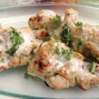 Chicken Malai Kabab · Boneless chicken breast cubes marinated with cashew cream, yogurt and roasted spices.