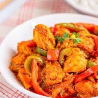Chicken Jal-Frezi · Tender boneless chicken stir-fried with bell peppers, onion and mixed with our chef's specia...