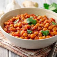 Chana Masala · Chickpeas cooked in roasted spices and curry sauce. Served with portion of basmati rice. 