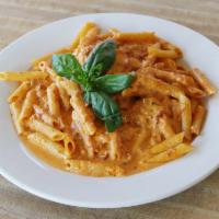 Penne alla Vodka · With bacon.