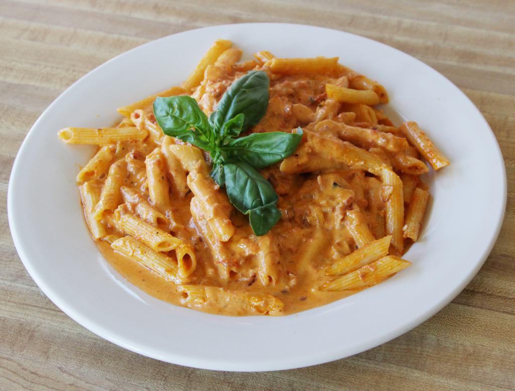 Penne alla Vodka · With bacon.