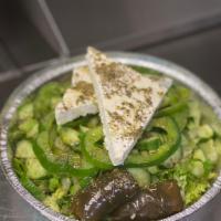 Green Salad · Lettuce, cucumbers, dill, and Kalamata olives, feta cheese, olive oil & vinegar 