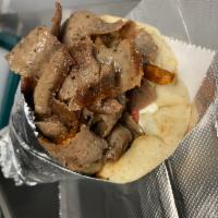 Yeero Beef & Lamb Sandwich (GYRO) · Yeero beef & lamb in round pita bread,topped with fresh cut fries,tzatziki,red onions & slic...