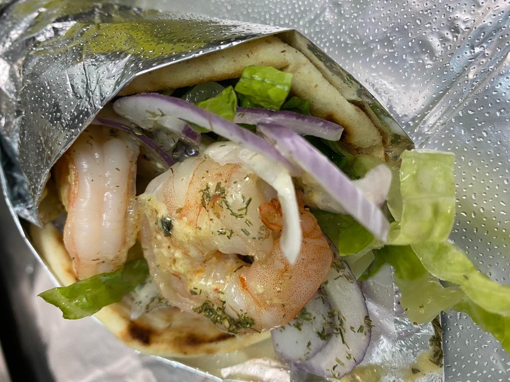 Shrimp Sandwich  · 5 shrimps in round pitta bread, topped with honey mustard, red onion lettuce, tomato & dill