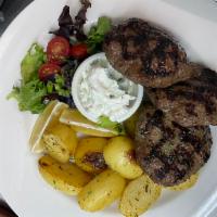 Biftekia (beef patties) · Beef loin patty seasoned and grilled