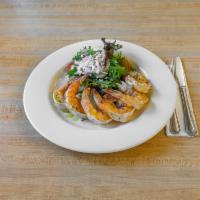 Grilled  Jumbo Shrimps · 6 pieces. With ladolemono lemon and oil served with a side salad.