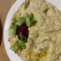 Hummus · Chickpea dip, served with fresh pitta.