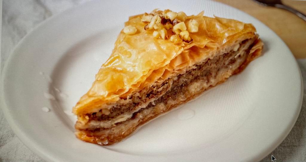 Baklava · Layers of phyllo filled with chopped nuts, sweetened, and held together with syrup.