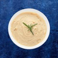 OG Hummus · Chickpeas boiled till soft, mashed, blended and mixed with garlic, tahini sauce, olive oil a...