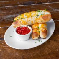 Garlic Cheese Bread  · 4 pieces of garlic cheese bread with red sauce