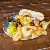 Beer Cheese Steak Sandwich · Our take on a Philly cheese steak. Warm seasoned beef, onion and green pepper on your choice...