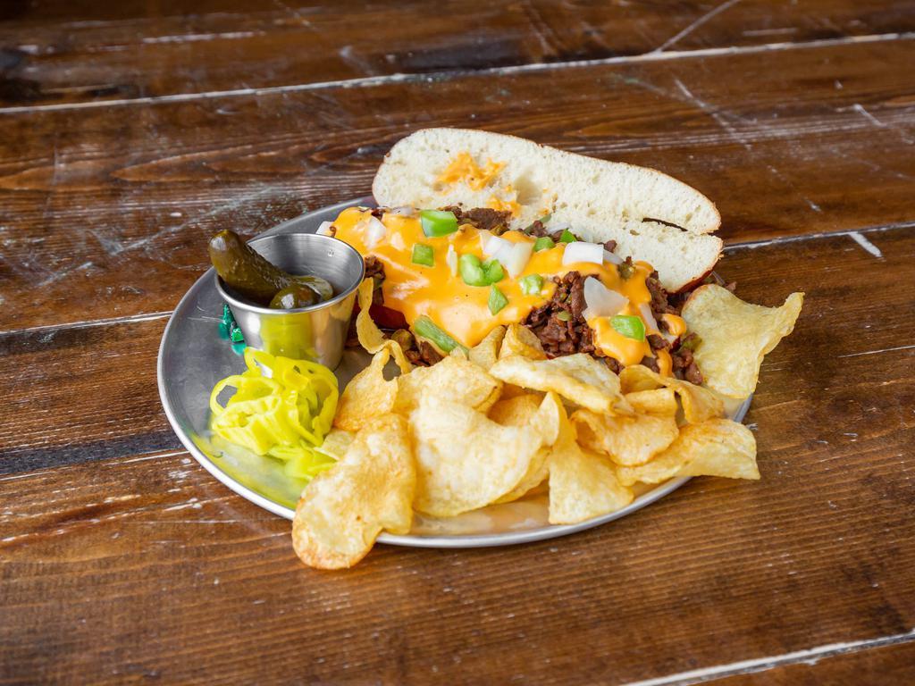 Beer Cheese Steak Sandwich · Our take on a Philly cheese steak. Warm seasoned beef, onion and green pepper on your choice of French roll or pretzel roll with beer cheese and pepperoncinis. 