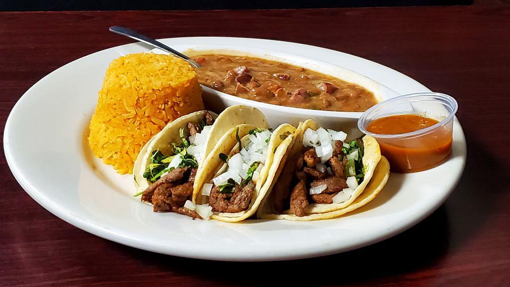 Street Tacos Plate · 3 tacos originally served with rice and charros beans.