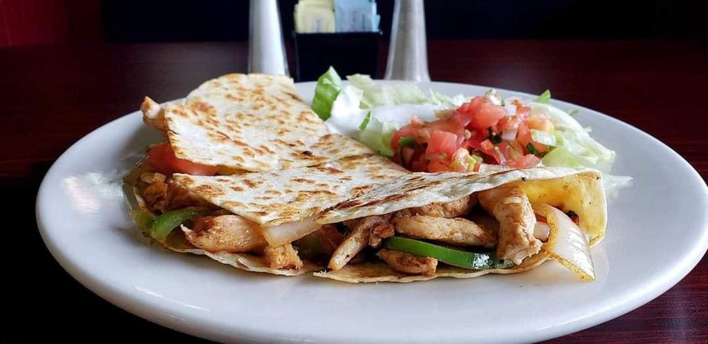 Single Chicken Fajita · Sauteed with bell peppers, onions, and tomatoes on a sizzling plate. Served with rice, beans, lettuce, Pico de Gallo, sour cream, guacamole and tortillas.