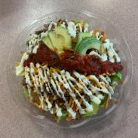 NEW Taco salad · Choice of chicken or steak, corn chips, dice tomatoes, red onions, shredded cheddar cheese,a...